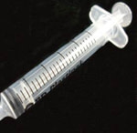 Syringe for hand feeding kittns